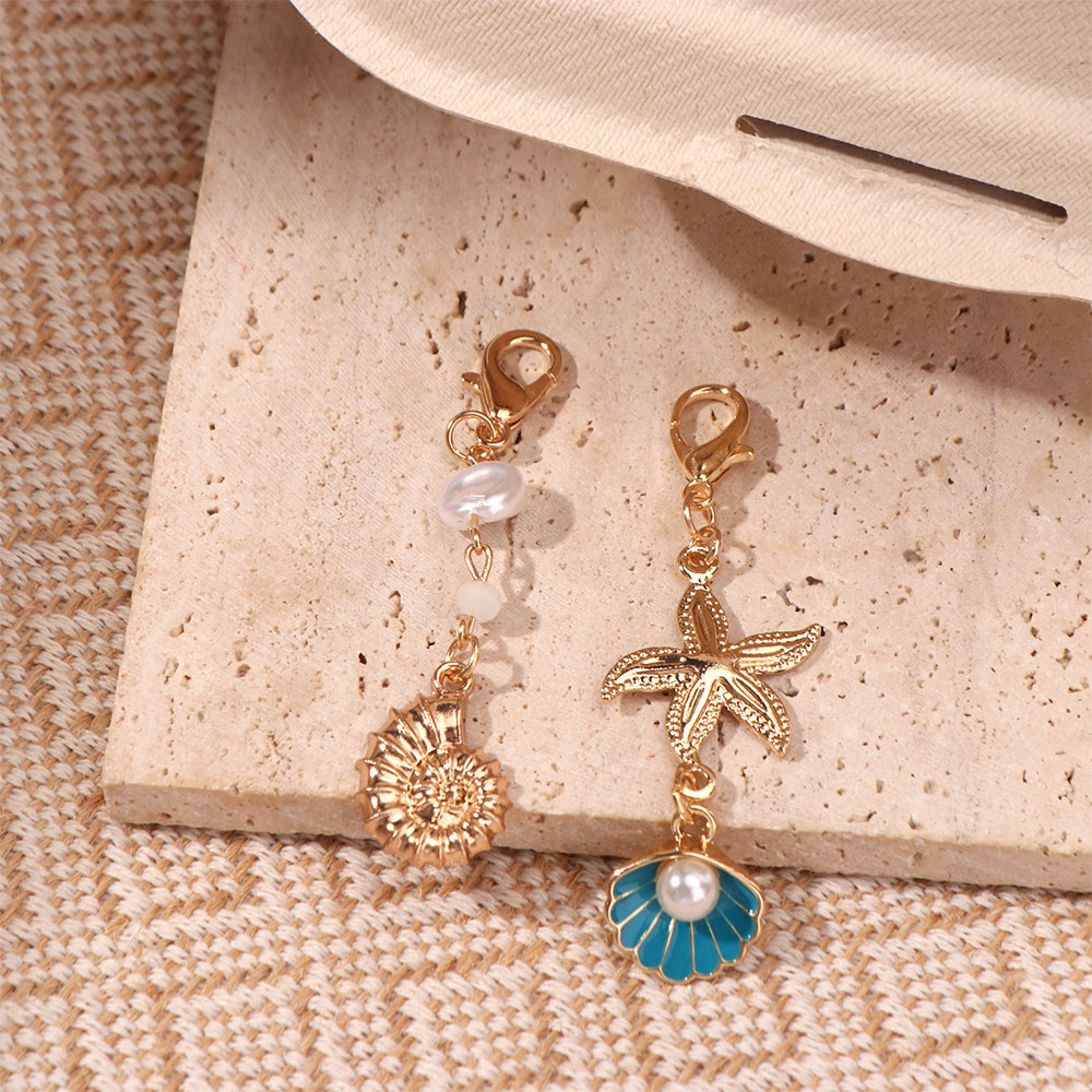 Portachiavi con Conchiglia a F - Body Jewelry Hangers recensione e prezzo